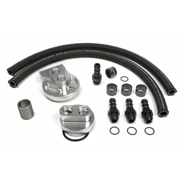 HAMBURGER'S PERFORMANCE PRODUCTS BILLET ALUMINUM SINGLE OIL FILTER RELOCATION KIT; VERTICAL PORT; 2-1/4 IN. I.D., 3-11/16 IN. O.D. OIL FILTER FLANGE; 1 IN.-16 NIPPLE- DODGE CUMMINS DIESEL; DODGE D250, D350, W250, W350 TRUCKS; RAM 2500 & 3500 TRUCKS WITH 5.9 OR 6.7L, OR ANY ENGINE THAT USES AN M1-403A, PH3976A OR EQUIVALENT ENGINE OIL FILTER